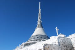 TV transmitter and mountain hotel Ještěd in winter